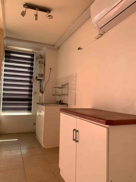 Cocina departamento en condominio hermanos maristas en los andes