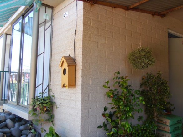 Vista lateral del frontis de la casa en venta en los andes villa aires de aconcagua